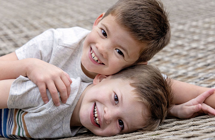 two brothers at a family photo session in pease park in austin, texas