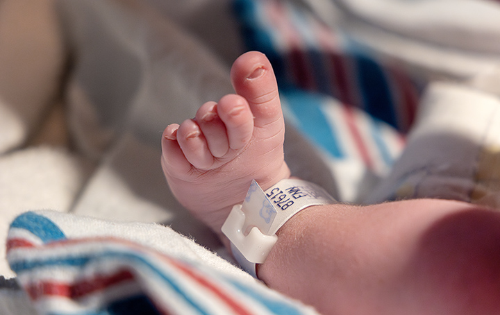 close-up of newborn baby's leg