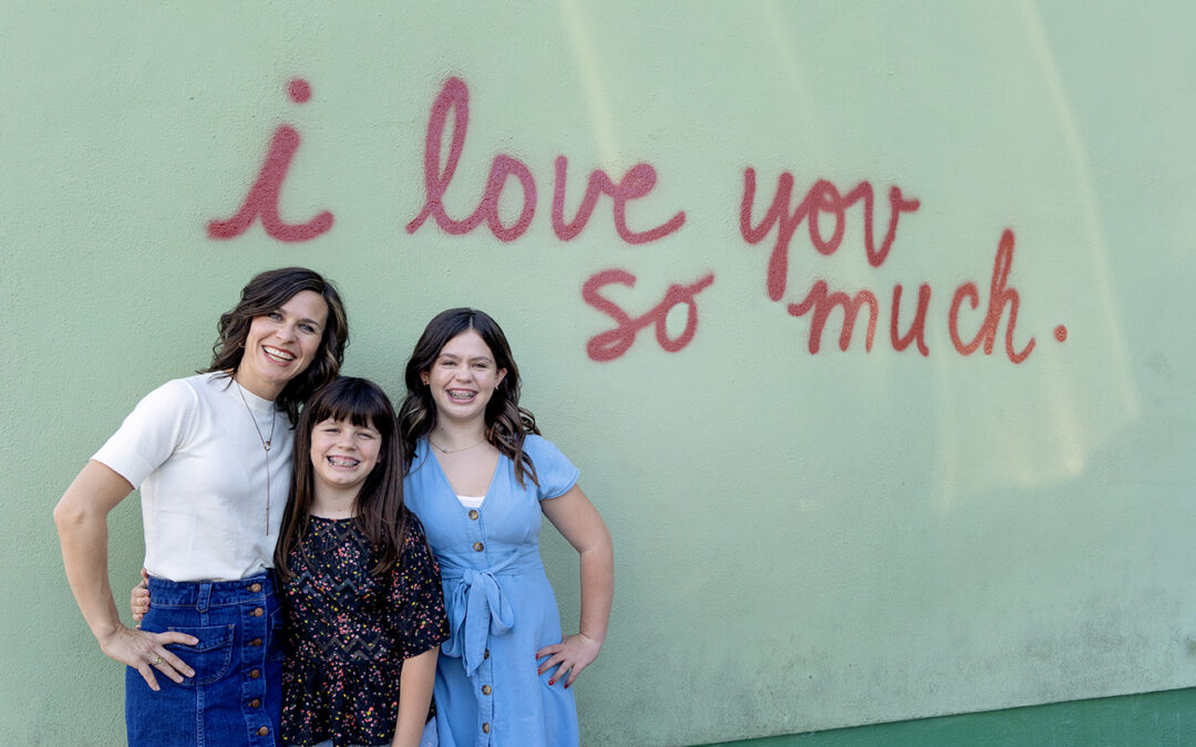i love you so much mural on south congress in austin, texas for family photo session