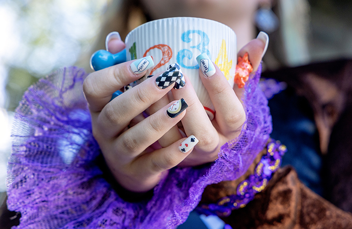 close-up of hands holding a tea cup
