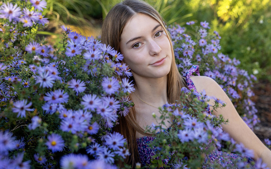portrait session among purple flowers at ACC campus in Austin, Texas