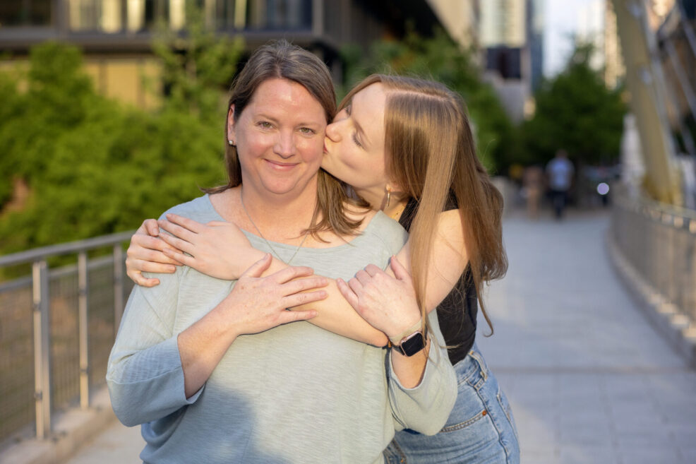 mom and daughter at her senior photo session in austin, texas downtown