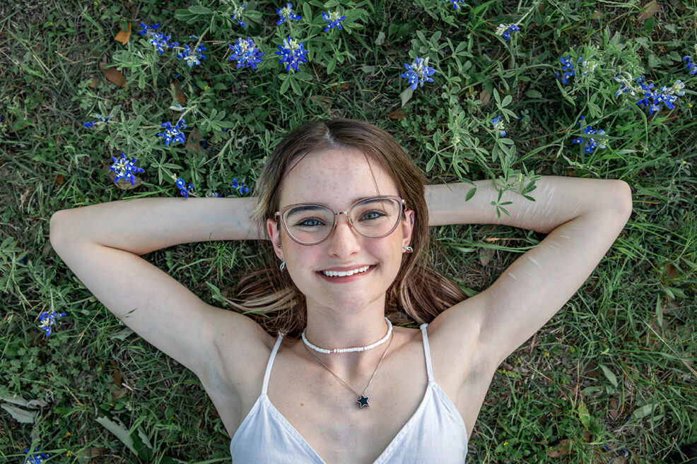 high school senior in the bluebonnets for her photo session