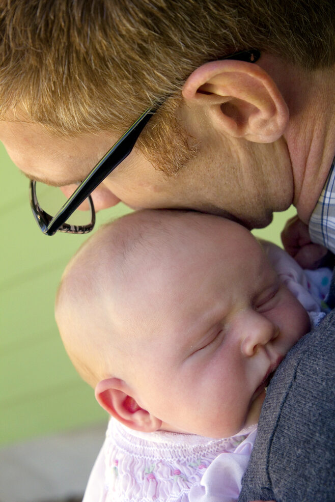 father and newborn daughter