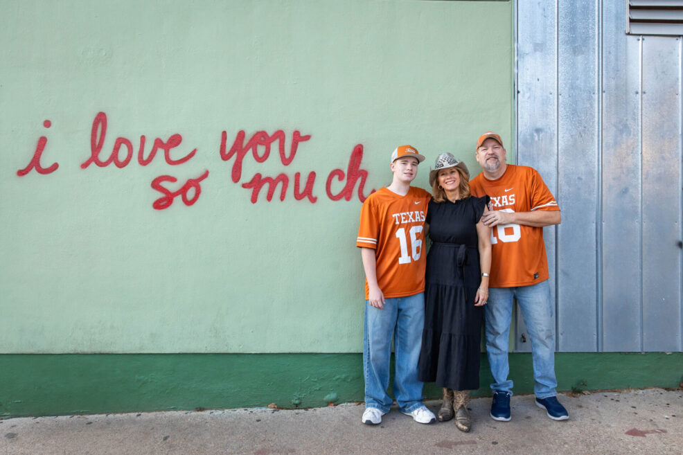 i love you so much mural at Jo's Coffee Shop for family of three photo session