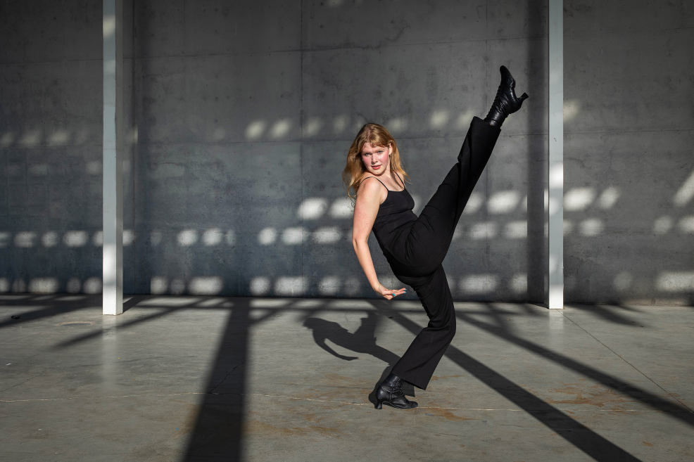 high school senior demonstrating her dance skills on the stage at Waterloo Park